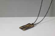 Todd Reed necklace in Sterling silver, 22k yellow gold, and black brilliant cut diamonds (~.26ct)